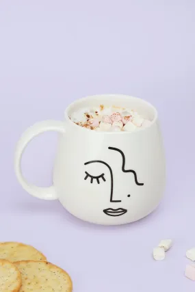 Large Mug with Abstract Face Design